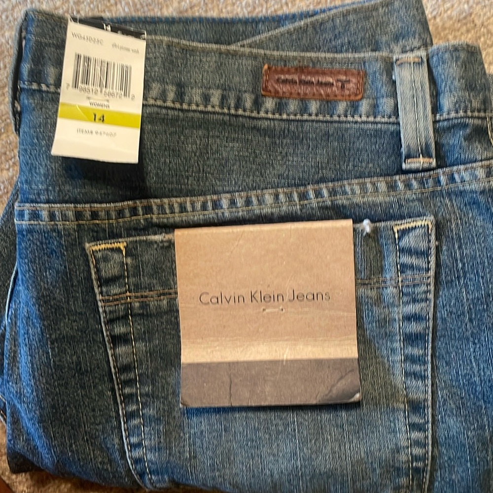 Calvin Klein cropped jeans, size 14,  cuffed at the bottom, 23” inseam.